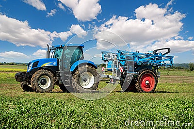 Mostys`kyi district, Lviv region, Ukraine - September 05, 2019: Agricultural machinery presentation - New Holland, new blue Editorial Stock Photo