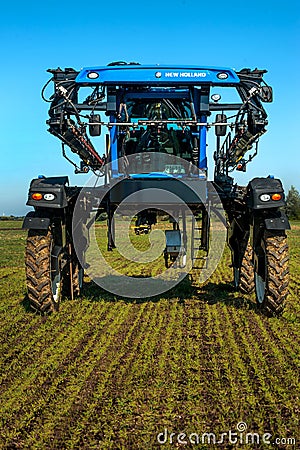 Mostys`kyi district, Lviv region, Ukraine - September 05, 2019: Agricultural machinery presentation - New Holland SP.275F self- Editorial Stock Photo