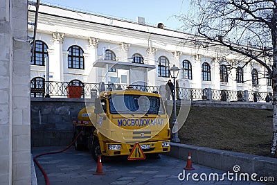 Mosvodokanal special truck in Zaryadye park of Moscow, Russia. Sunny spring view. Editorial Stock Photo