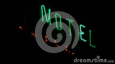 Motel Advertising Panel with Red and Green Neon Letters Lighting Stock Photo