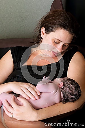 Mother Adores Her Newborn Baby Stock Photo