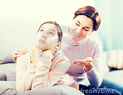 Mother asks daughter to reconcil Stock Photo