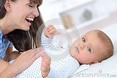 Mother and baby happy family moms love and tenderness Stock Photo