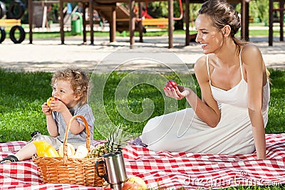 Mother and baby having picnic Stock Photo