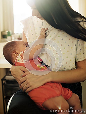 Mother and Baby Newborn Love Emotional Family Stock Photo