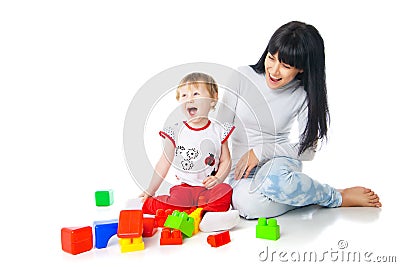 Mother and baby playing with building blocks toy Stock Photo