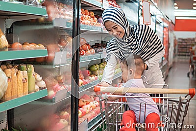 Mother and baby shopping Stock Photo