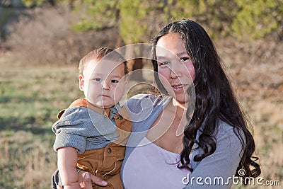 Mother and baby son outdoors Stock Photo