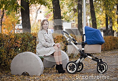 Mother with baby stroller for a newborn Stock Photo