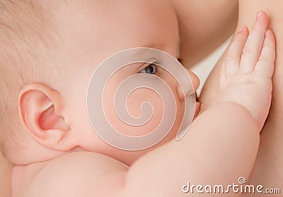 Baby breast feeding Stock Photo