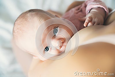 Mother breastfeeding newborn baby child Stock Photo