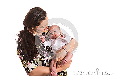 Mother caring newborn baby girl Stock Photo