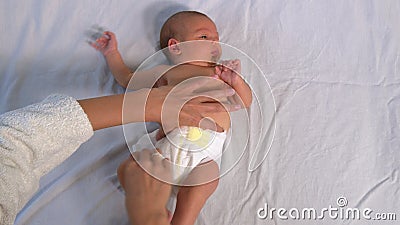 Newborn Baby Girl In Bed Top View Of Lovely Infant In White Pajama With Open Mouth Lying On Bed Moving Arms And Legs Stock Footage Video Of Indoor Adorable