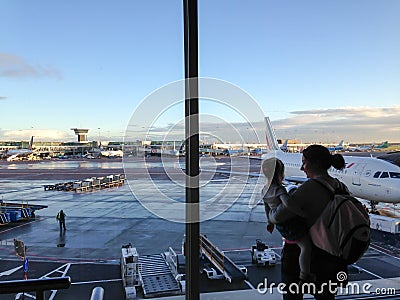 Mother and child at airport Editorial Stock Photo