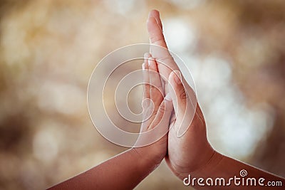 Mother and child daughter making hi five gesture Stock Photo