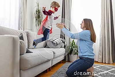 Mother and Child Playful Living Room Fun Stock Photo