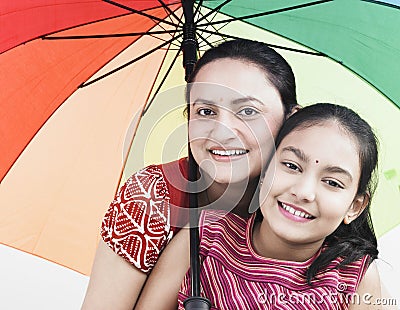 Mother and child and umbrella Stock Photo