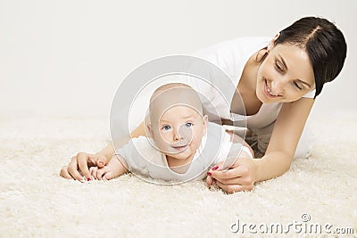 Mother and Crawling Baby, Infant Child Raised Head, Active Kid Stock Photo