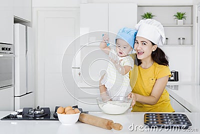 Mother and daughter cooking bakery together Stock Photo