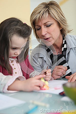 Mother and daughter drawing Stock Photo