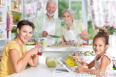 Mother and daughter having breakfast Stock Photo