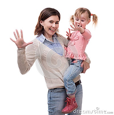 Mother with daughter in her arms with palms up Stock Photo