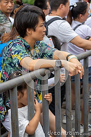 Mother and daughter queuing to the Zhangjiajie national park Editorial Stock Photo