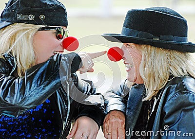 Mother and daughter smiling laughing having fun together Stock Photo