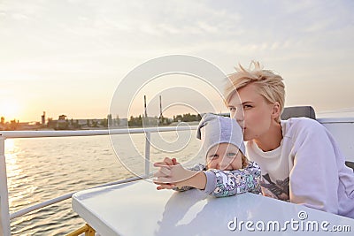 Mother, daughter on yacht or catamaran boat Stock Photo