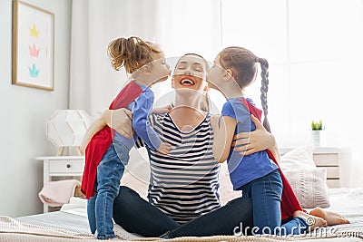 Mother and daughters playing Stock Photo