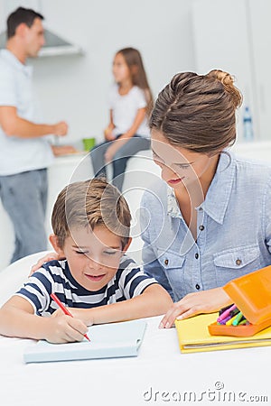 Mother drawing with her son Stock Photo