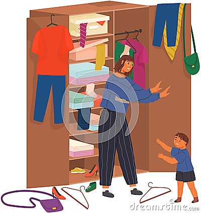 Mother forbids child to take their things from wardrobe. Kid violates personal space, disturbs order Stock Photo