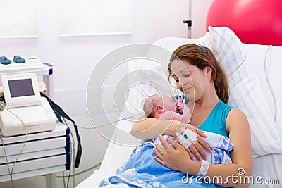 Mother giving birth to a baby. Stock Photo