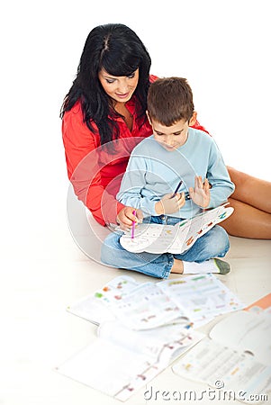 Mother helping son with homework Stock Photo