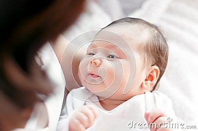 Mother with her newborn baby. Mother is holding her little baby Stock Photo