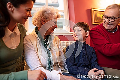 Mother, her son and grandparents Stock Photo