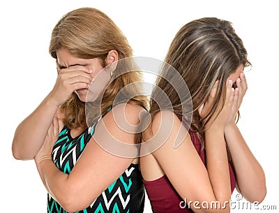 Mother and her teenage daughter both crying Stock Photo