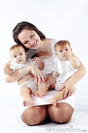 Mother with her twins Stock Photo