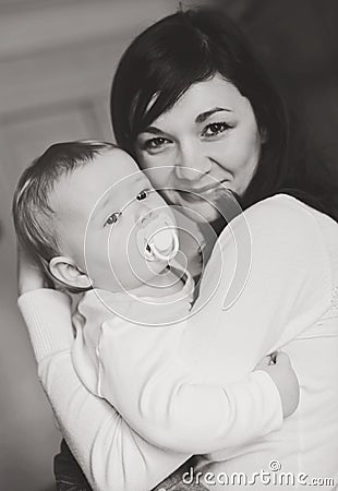 Mother holding baby son Stock Photo