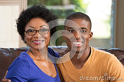 Mother hugging her adult son. Stock Photo