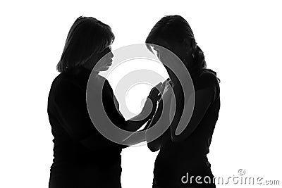 Mother on an isolated background comforted her teenage daughter who was crying Stock Photo