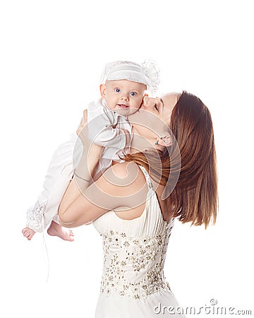 The mother kisses her firstborn. Isolated. Stock Photo