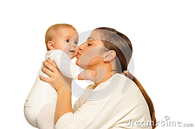 Mother kissing baby Stock Photo