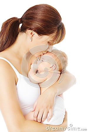 Mother kissing newborn baby holding in hand, white Stock Photo