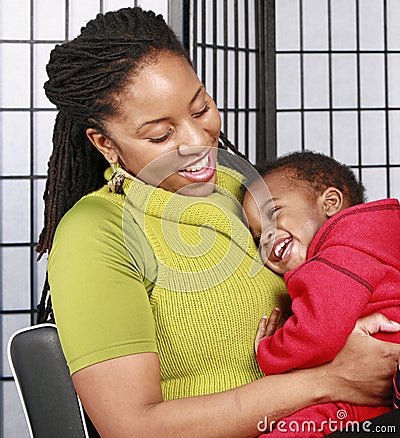 Mother with laughing baby Stock Photo