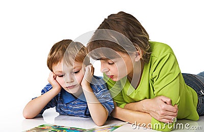 Mother learns the child to read Stock Photo
