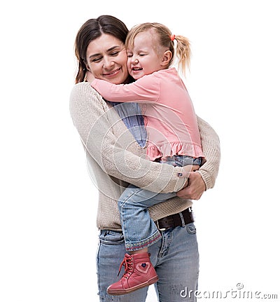 Mother with little daughter in her arms hugging Stock Photo