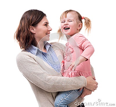 Mother with little daughter in her arms hugging Stock Photo