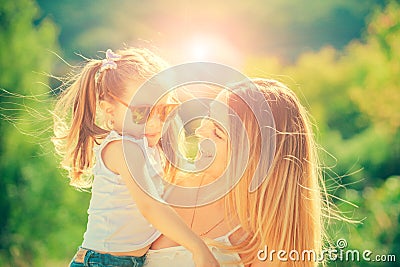 Mother love. Mother and daughter spending time together. Happy mother hugging her daughter. Family generation and people Stock Photo