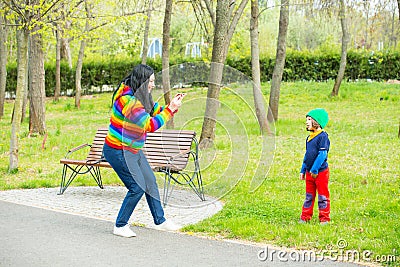 Mother making photo to his son Stock Photo